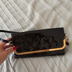 Louis Vuitton Black Patent Clutch with Gold Accent